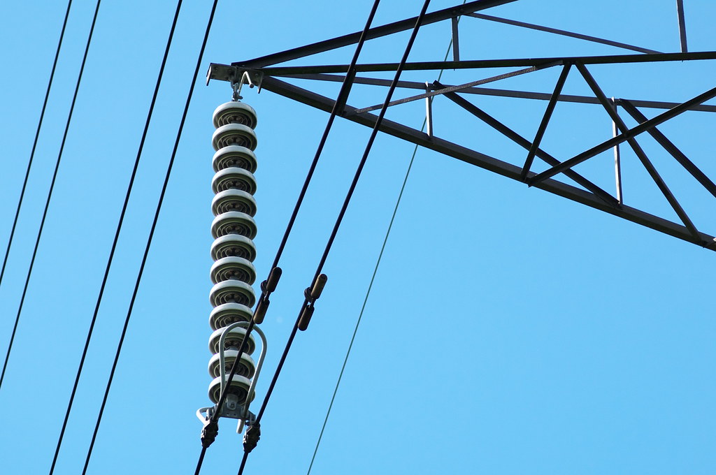 Suspension insulator strings protecting new transmission line equipment